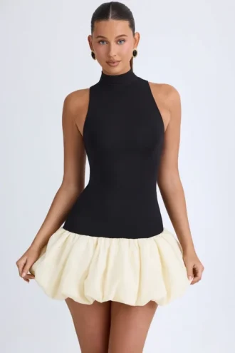Nabila Modal Turtleneck Drop-Waist Bubble Hem Mini Dress in Black
