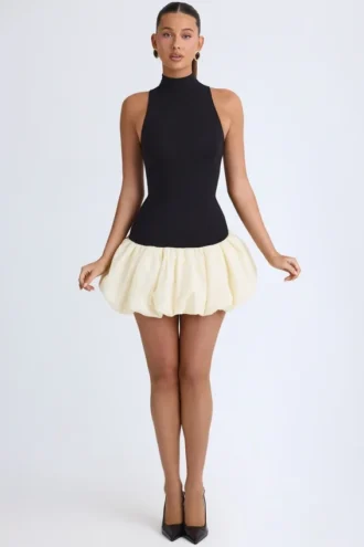 Nabila Modal Turtleneck Drop-Waist Bubble Hem Mini Dress in Black