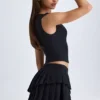 Nada Layered Pleated Low-Rise Mini Skirt in Black