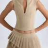 Nada Layered Pleated Low-Rise Mini Skirt in Camel
