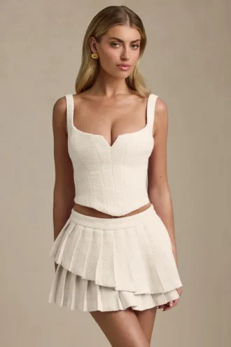 Nada Layered Pleated Low-Rise Mini Skirt in Ivory