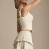 Nada Layered Pleated Low-Rise Mini Skirt in Ivory Nada Layered Pleated Low-Rise Mini Skirt in Ivory