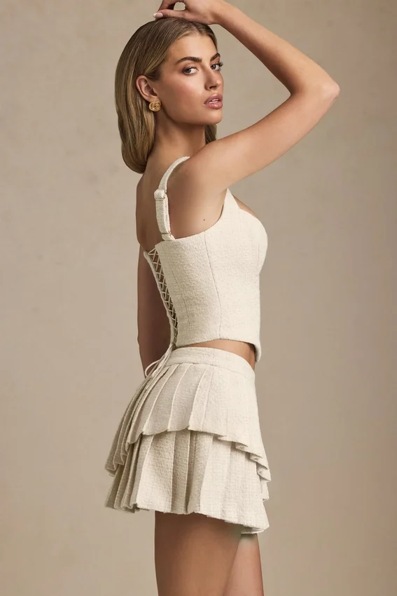 Nada Layered Pleated Low-Rise Mini Skirt in Ivory Nada Layered Pleated Low-Rise Mini Skirt in Ivory