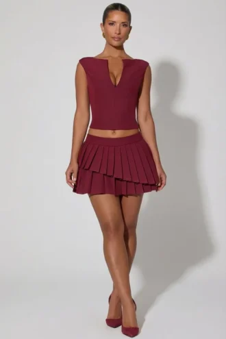 Nada Layered Pleated Low-Rise Mini Skirt in Wine Red