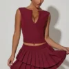 Nada Layered Pleated Low-Rise Mini Skirt in Wine Red