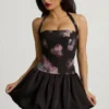 Nanala Halterneck Lace-Up Bubble Hem Mini Dress in Black Floral Print