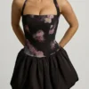 Nanala Halterneck Lace-Up Bubble Hem Mini Dress in Black Floral Print