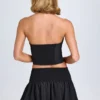 Nellary Ruffled Shirred Low-Rise Micro Mini Skirt in Black Nellary Ruffled Shirred Low-Rise Micro Mini Skirt in Black