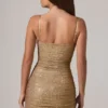 Neréa Embellished Peekaboo Ruched Mini Dress in Gold