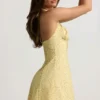 Nerine Halterneck A-Line Mini Dress in Yellow Flower Print