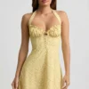 Nerine Halterneck A-Line Mini Dress in Yellow Flower Print