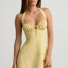 Nerine Halterneck A-Line Mini Dress in Yellow Flower Print