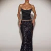 Nevara Embellished Mid-Rise Thigh-Split Maxi Skirt in Black Purple
