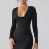 Oakley Slinky Jersey Long Sleeve Plunge Neck Mini Dress in Black