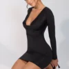 Oakley Slinky Jersey Long Sleeve Plunge Neck Mini Dress in Black