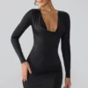 Oakley Slinky Jersey Long Sleeve Plunge Neck Mini Dress in Black