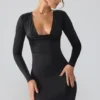 Oakley Slinky Jersey Long Sleeve Plunge Neck Mini Dress in Black