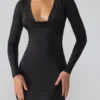 Oakley Slinky Jersey Long Sleeve Plunge Neck Mini Dress in Black