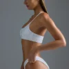 Oh Polly Swim: HOTFIX Edition Embellished One-Shoulder Bandeau Bikini Top in White