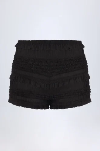 Orla Ruffled Mid-Rise Shorts in Black