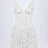 Orren Embellished Ruffled Tiered Mini Dress in White