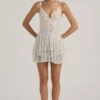 Orren Embellished Ruffled Tiered Mini Dress in White