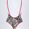Ostend Charm-Detail Cross-Back Swimsuit in Zebra Print