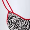 Ostend Charm-Detail Cross-Back Swimsuit in Zebra Print
