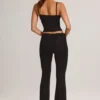 Patsy Modal Mid-Rise Flared Trousers in Black