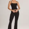 Patsy Modal Mid-Rise Flared Trousers in Black