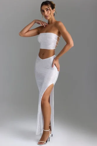 Pelagia Embellished V-Waist Thigh-Split Maxi Skirt in White
