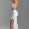 Pelagia Embellished V-Waist Thigh-Split Maxi Skirt in White