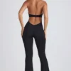 Pema Modal Lace-Trim Cut-Out Flared Jumpsuit in Black