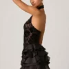 Petalia Embellished Ruffled Halterneck Mini Dress in Black