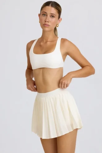 pleated tennis skirt in white 2 330x495 - Pleated Tennis Skirt in White