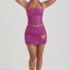 Querida Embellished Heart-Detail A-Line Micro Mini Skirt in Magenta