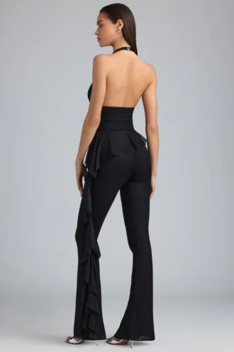 Reese Metallic Ruffle Low-Rise Flared Trousers in Black