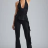 Reese Metallic Ruffle Low-Rise Flared Trousers in Black
