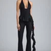 Reese Metallic Ruffle Low-Rise Flared Trousers in Black