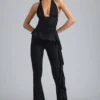 Reese Metallic Ruffle Low-Rise Flared Trousers in Black