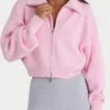 Ribbed Knit Zip-Up Cropped Sweatshirt in Pale Pink