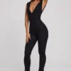 Romana Plunge Neck Ruched Waist Jumpsuit in Black