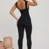 Romana Plunge Neck Ruched Waist Jumpsuit in Black