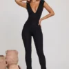Romana Plunge Neck Ruched Waist Jumpsuit in Black