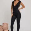 Romana Plunge Neck Ruched Waist Jumpsuit in Black