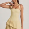 Rosaria Asymmetric Layered Halterneck Mini Dress in Pastel Yellow