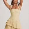 Rosaria Asymmetric Layered Halterneck Mini Dress in Pastel Yellow