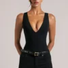Rumi Deep Plunge Halterneck Bodysuit in Black