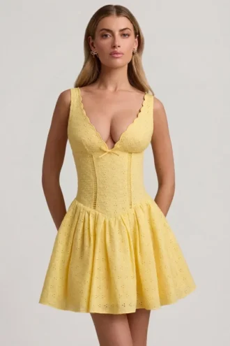 Sabina Broderie Anglaise Bow-Detail A-Line Mini Dress in Pastel Yellow