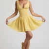 Sabina Broderie Anglaise Bow-Detail A-Line Mini Dress in Pastel Yellow